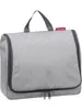A grey toiletry bag with a handle and zippers. Produktbild-Vorschau