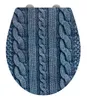 A toilet seat with a blue knitted cable pattern. Produktbild-Vorschau