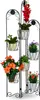 A multi-tiered metal plant stand with various potted plants. Náhľad obrázku produktu