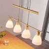 Lindby Hängelampe Simeon, messingfarben, Glas, 73 cm, E14 Produktbild-Vorschau 2