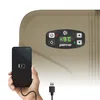 A hand holds a smartphone that is charging from a PEME Essential 26 Liter electric cooler. The cooler has a digital display showing -9°C and a USB port. Anteprima dell’immagine prodotto