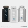 Three Homematic IP smart home radiator thermostats in different colors (anthracite, white, and silver) are displayed against a light gray background. Produktbild-Vorschau