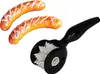 A black sausage cutter tool and two grilled sausages on a white background. Produktbild-Vorschau