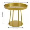 A gold round side table with three legs and a circular base, shown against a white background with dimensions indicated by text and arrows. Podgląd zdjęcia produktu