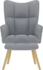 A gray armchair with wooden legs on a white background. Náhľad obrázku produktu