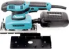 A Makita orbital sander with its dust collector and an accessory plate, shown against a white background. Produktbild-Vorschau