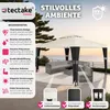 A garden pavilion set up with outdoor furniture on a patio overlooking the ocean. Produktbild-Vorschau