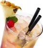 A close-up of a cocktail with ice, a cherry, mint, and a pineapple slice garnish. Produktbild-Vorschau