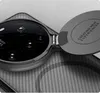 Close-up of a smartphone camera lens cover with text on it. Produktbild-Vorschau