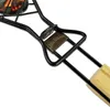 Close-up of a BBQ fish grill with a wooden handle and a metal plate with the Jim Beam logo. Produktbild-Vorschau