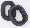 Two black headphone ear pads are shown on a white background. One ear pad is lying on top of the other. Náhľad obrázku produktu