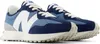 A pair of blue and white New Balance sneakers. Anteprima dell’immagine prodotto