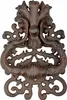 A close-up of a decorative door knocker. Produktbild-Vorschau
