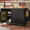 A black kitchen island with various storage features, including drawers, shelves, and a towel rack, shown in a kitchen setting. Produktbild-Vorschau