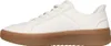 Side view of a white sneaker with a brown sole. Voir les images du produit