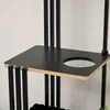 A close-up view of a black platform with a circular cutout, part of a cat tree structure, with black vertical supports and a light wood-colored edge. Náhľad obrázku produktu