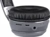 A close-up view of the side of a pair of headphones, showing various ports and the ear cushion. Náhľad obrázku produktu