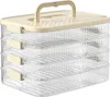A multi-tiered food storage container with a handle on top. Produktbild-Vorschau