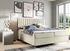 A bedroom scene with a bed, nightstand, lamp, and artwork. Produktbild-Vorschau