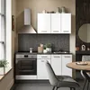 A modern, compact kitchen setup with white high-gloss cabinets, a stainless steel range hood, and a built-in oven. A dining table and chairs are visible in the foreground, suggesting a functional living space. Produktbild-Vorschau