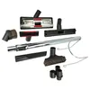 A collection of vacuum cleaner attachments laid out on a white background. Produktbild-Vorschau