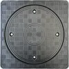 A top-down view of a black, square manhole cover with a circular opening in the center. The cover has a textured grid pattern and is secured with screws. Náhľad obrázku produktu