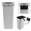 A collage of images showing a gray plastic trash can with a black lid and handle, and a close-up of its mounting mechanism. Produktbild-Vorschau