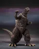 A Godzilla action figure posed against a dark, smoky background. Náhled obrázku produktu
