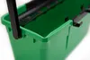 A close-up view of the top edge of a green plastic bucket with a black handle. Voir les images du produit