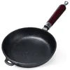 A cast iron frying pan with a wooden handle is shown against a white background. Náhľad obrázku produktu