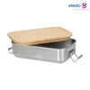 A stainless steel lunchbox with a bamboo lid is shown against a white background. Anteprima dell’immagine prodotto