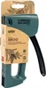 A staple gun in its packaging, with pine branches and a pine cone illustration on the cardboard. Podgląd zdjęcia produktu