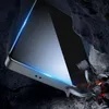 A smartphone screen protector is shown in a dramatic, rocky environment with glowing blue edges. Voir les images du produit