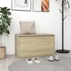 A hallway scene with a shoe bench, plant, coat rack, and slippers. Anteprima dell’immagine prodotto
