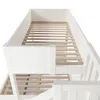 A close-up, high-angle view of a white bunk bed frame with wooden slats. Náhled obrázku produktu