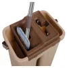 A close-up view of a mop and bucket system, showing the mop head inside the bucket's cleaning mechanism. Náhled obrázku produktu