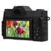 The back of a black digital camera displaying a close-up image of tulips on its screen. Podgląd zdjęcia produktu