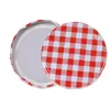Two jar lids with a red and white gingham pattern are shown against a white background. Podgląd zdjęcia produktu