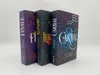 Three books standing upright on a white surface. Náhľad obrázku produktu