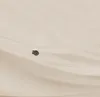 A close-up view of a cream-colored duvet cover with a zipper. Produktbild-Vorschau