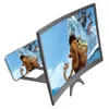 A smartphone is placed on a stand in front of a larger screen, both displaying the same animated movie scene. Náhled obrázku produktu