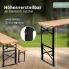 A wooden picnic table and benches are shown outdoors on a deck, with one table leg extended to demonstrate its height adjustability. Produktbild-Vorschau