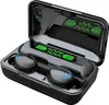 A pair of black wireless earbuds in their charging case, with the charging case lid open, showing the digital display. Náhled obrázku produktu