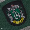 A close-up of a Slytherin house crest patch on a green and gray striped scarf. Náhled obrázku produktu