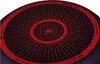 The bottom of a black cooking pan with a red patterned surface. Anteprima dell’immagine prodotto