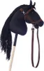 A black hobby horse with a brown bridle and reins against a white background. Anteprima dell’immagine prodotto