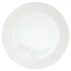 A white plate with a decorative rim. Produktbild-Vorschau