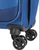 A close-up view of the wheels and bottom corner of a blue suitcase. Produktbild-Vorschau