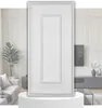A white panel is displayed in front of a living room setting with furniture and decor. Produktbild-Vorschau