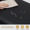 A hand is wiping a black surface with a cloth, with water droplets on the surface. Below are icons and text describing material properties. Produktbild-Vorschau